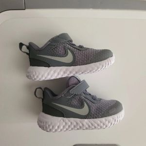 Gray Nike baby shoes